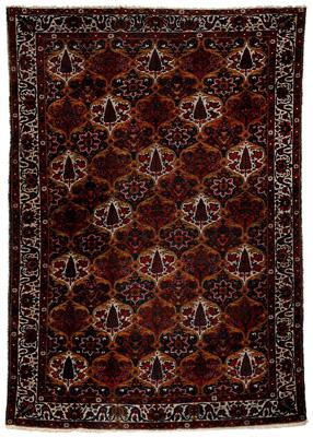 Appraisal: Baktiari rug repeating tree and flower designs on diagonal grid