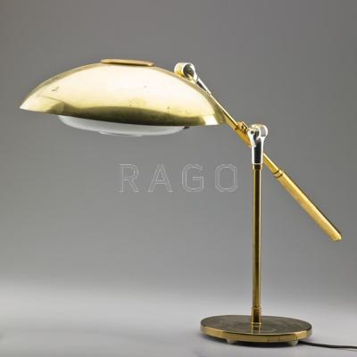 Appraisal: DAZOR Adjustable-arm table lamp s Brass enameled and anodized aluminum