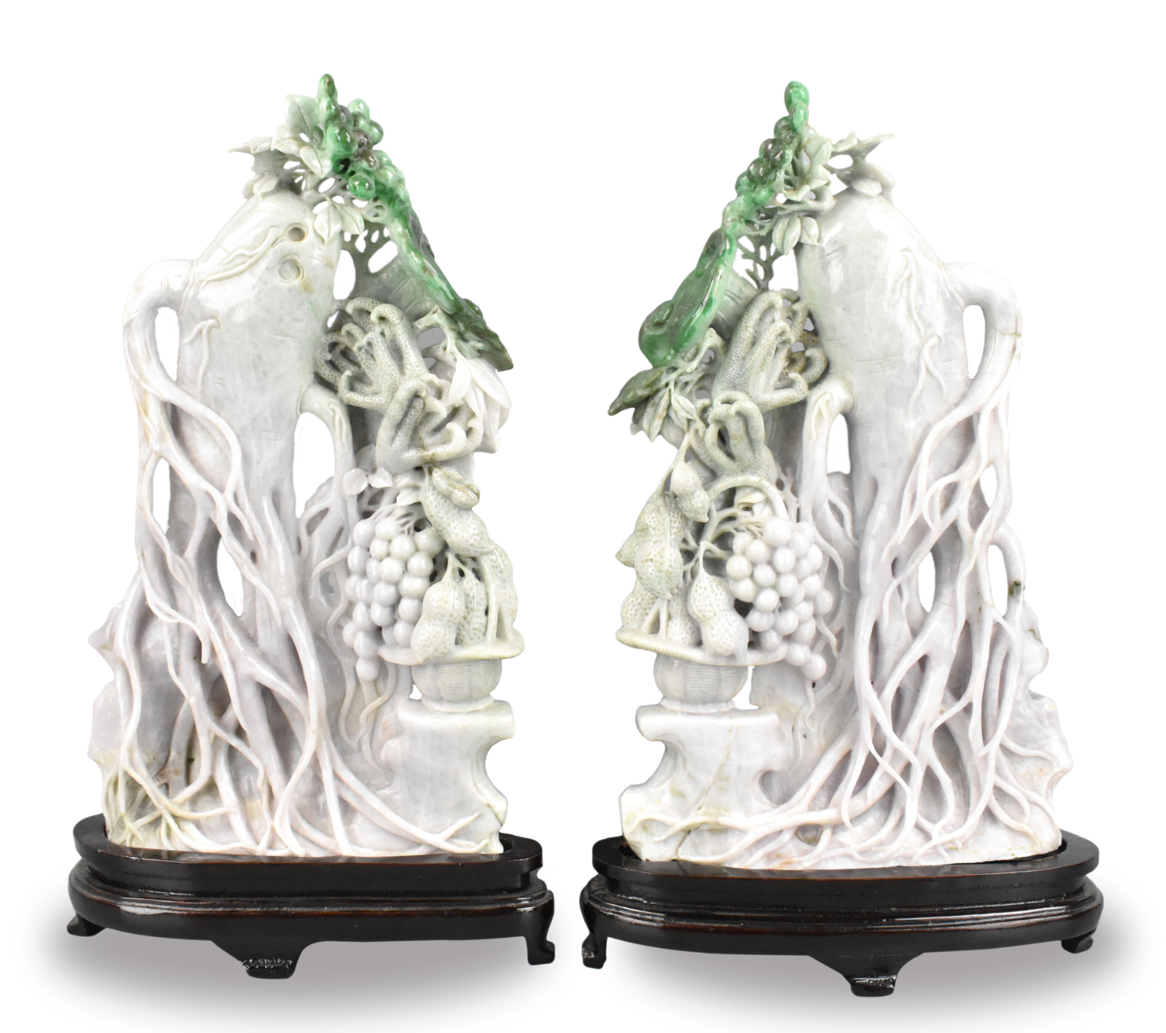 Appraisal: A pair of large Chinese jadeite carvings of ginseng roots