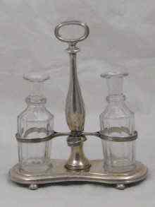 Appraisal: A two bottle Russian silver cruet frame with two bottles