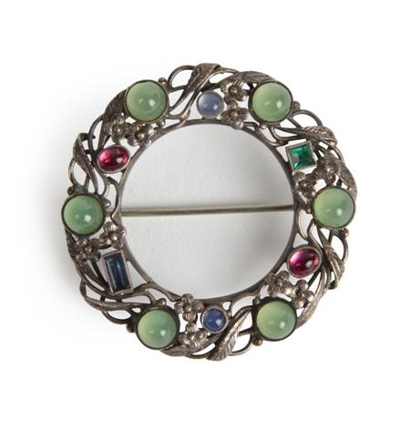 Appraisal: EDITH LINNELL EDWARDIAN GEM SET BROOCH CIRCA of filigree circular