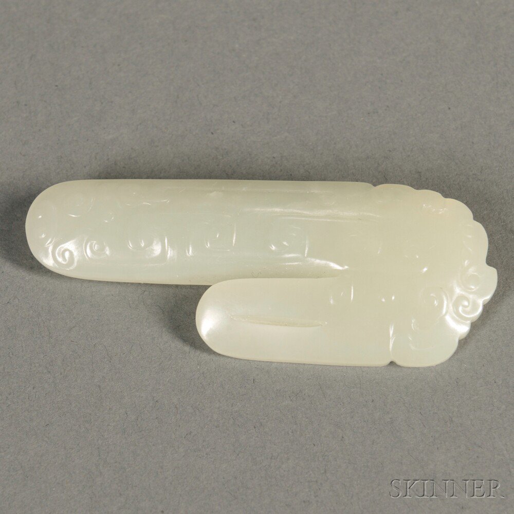 Appraisal: Jade Scroll Clasp China the longer tab carved in low