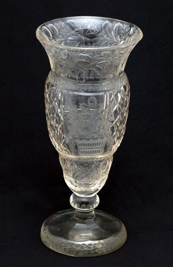 Appraisal: Clear glass pedestal vase intaglio cut with baskets of flowers