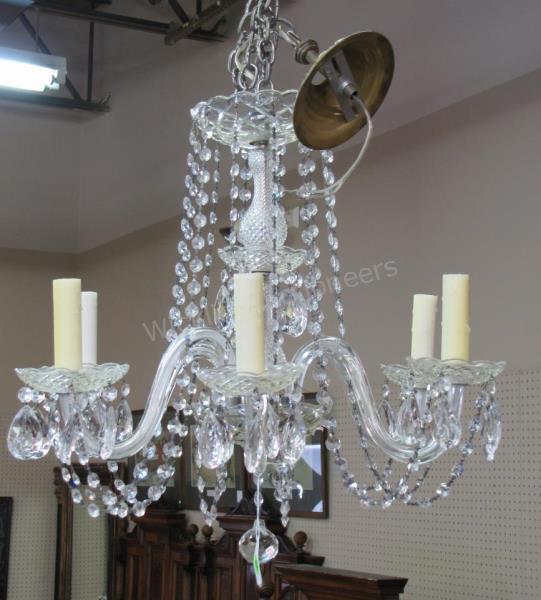 Appraisal: A vintage -light crystal chandelier with crystal arms candlestick fixtures