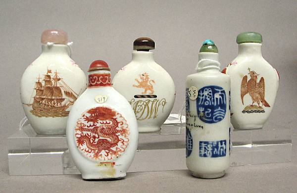 Appraisal: Five enameled porcelain snuff bottles The first with iron red