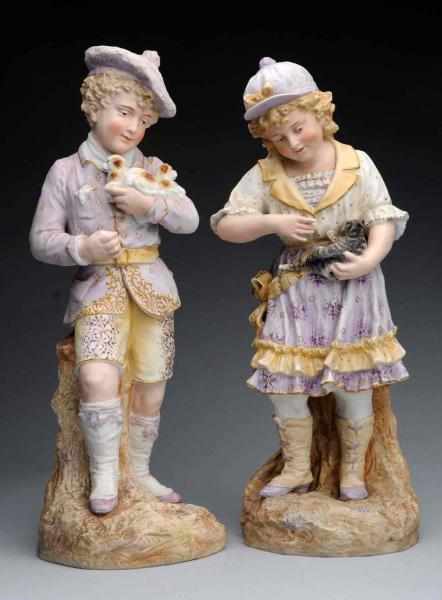 Appraisal: Pair of German Bisque Figurines Matching set lovely girl with