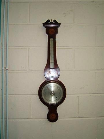 Appraisal: An early to mid th Century mahogany barometer with swan