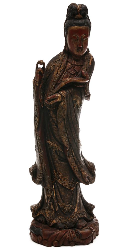 Appraisal: A LATE TH C CHINESE CARVED WOOD HO-HSIEN KU FIGURE