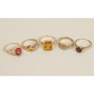 Appraisal: Five Assorted Citrine Rings Five assorted citrine rings comprising a