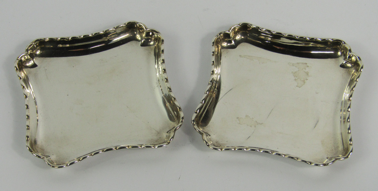 Appraisal: A pair of Victorian silver square trinket dishes William Comyns