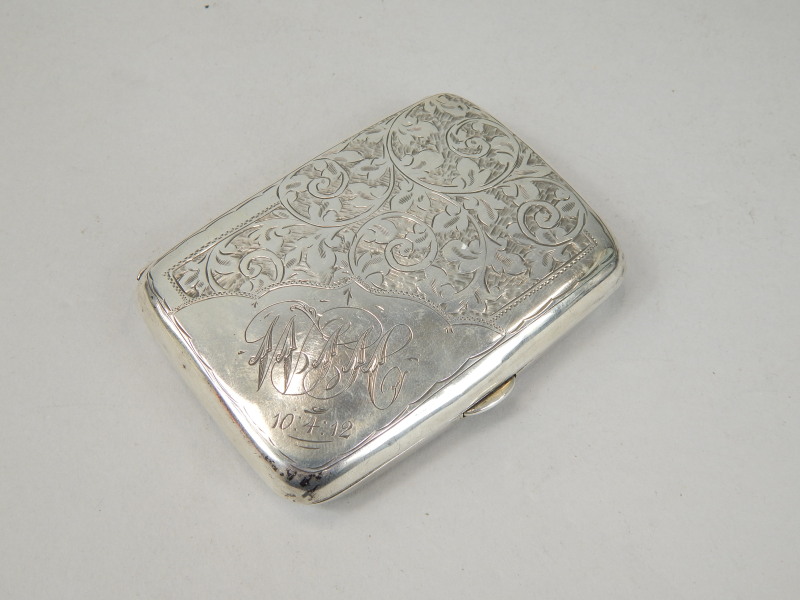 Appraisal: A George V silver cigarette case the shaped oblong body