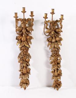 Appraisal: Pair of Spanish Carved Giltwood Wall Candelabra In the form