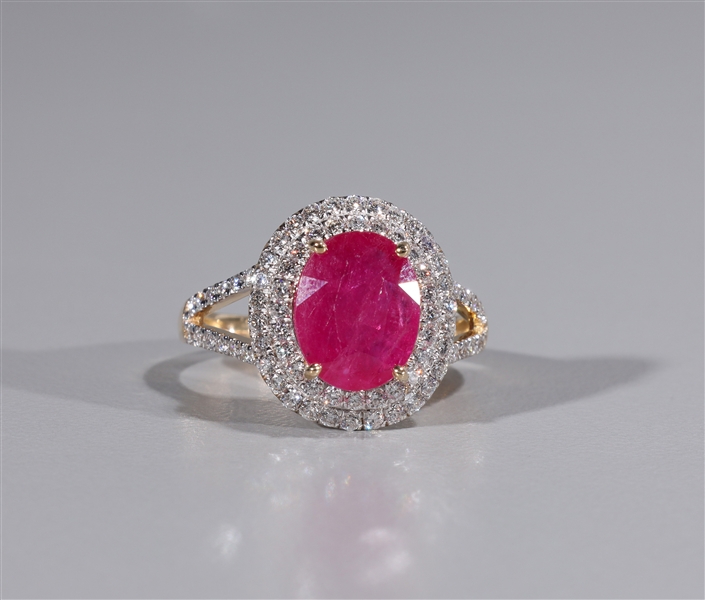 Appraisal: k gold ring with large ruby and many diamonds interior