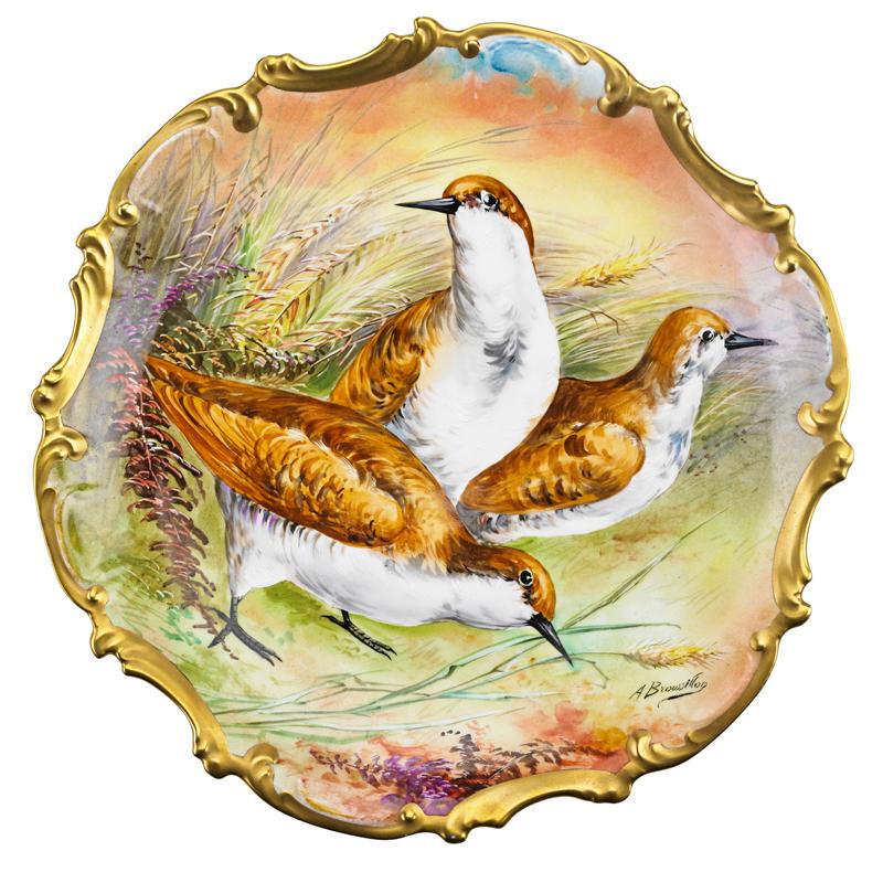 Appraisal: PAIR OF LIMOGES PORCELAIN CHARGERS One depicting a male pheasant