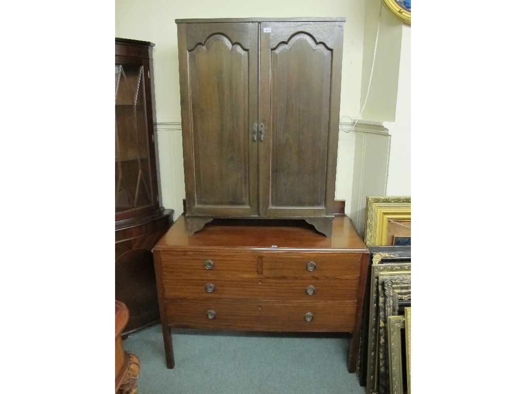 Appraisal: Edwardian mahogany chest of drawers and a cupboard chest