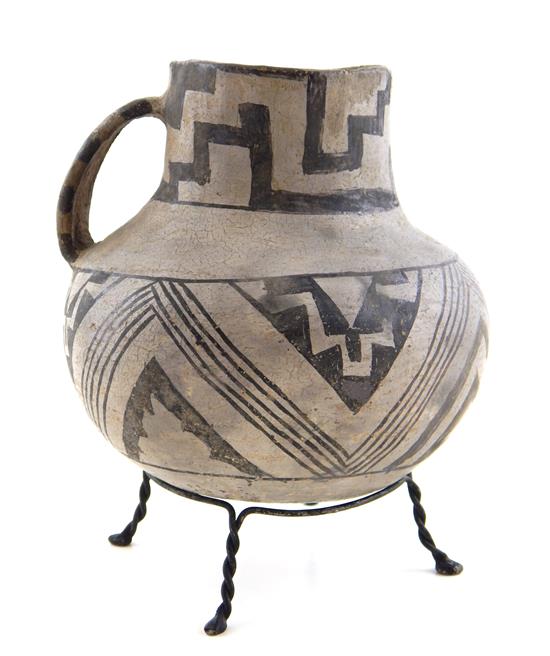 Appraisal: TRIBAL Anasazi black on white pitcher on four-legged wire stand