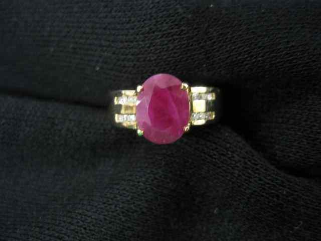 Appraisal: Ruby Diamond Ring rich oval gem weighing carats with two