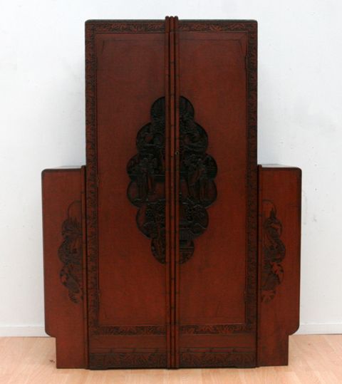 Appraisal: A carved Shanghai Art Deco wardrobe of tiered form circa