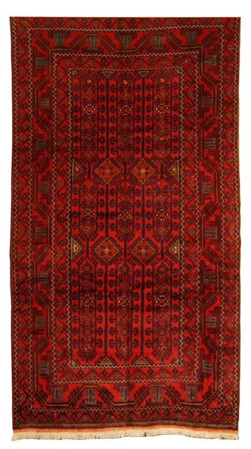 Appraisal: ORIENTAL RUG TURKOMAN ' x ' Red field of dark