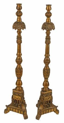 Appraisal: pair Italian carved giltwood floor candlesticks th c approx h