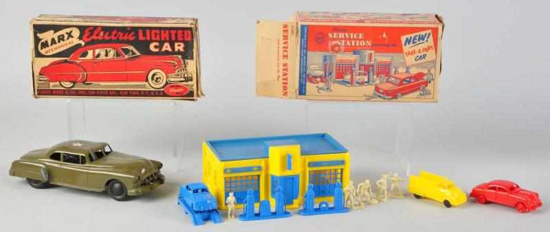 Appraisal: Lot of Plastic Marx Vehicle Toys American Includes one electric