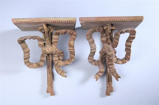 Appraisal: PAIR ITALIAN CARVED PAINTED AND GILT WOOD WALL BRACKETS late