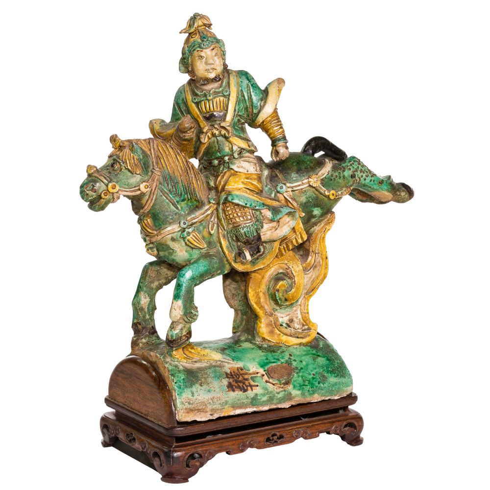 Appraisal: CHINESE ROOF TILEFigure riding a horse having writing on front