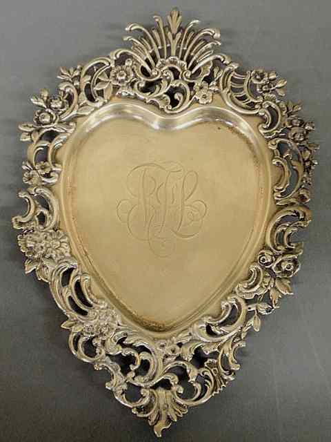 Appraisal: Sterling silver heart shaped dish with center monogram x