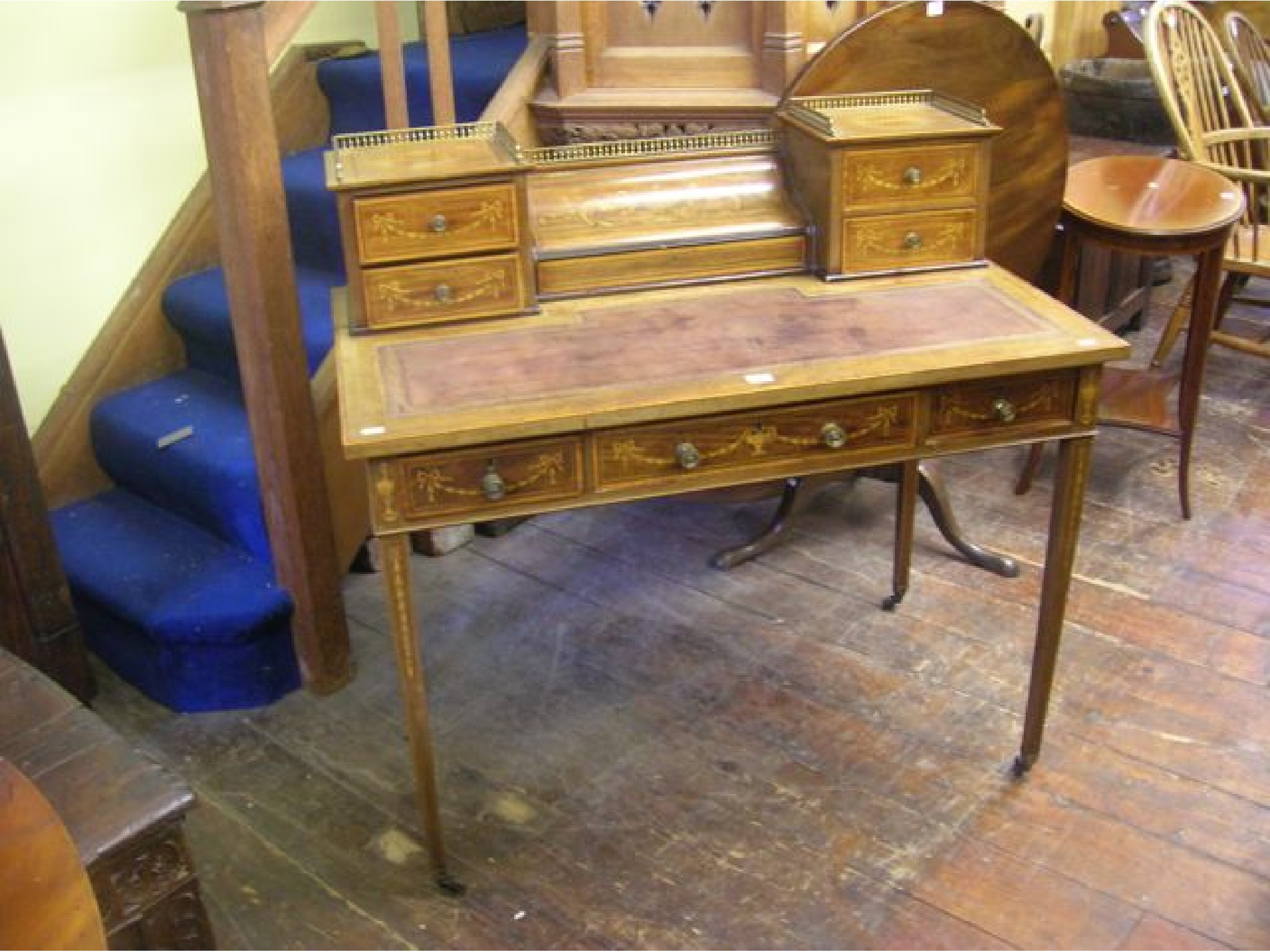 Appraisal: An inlaid Edwardian mahogany ladies writing desk fitted with three