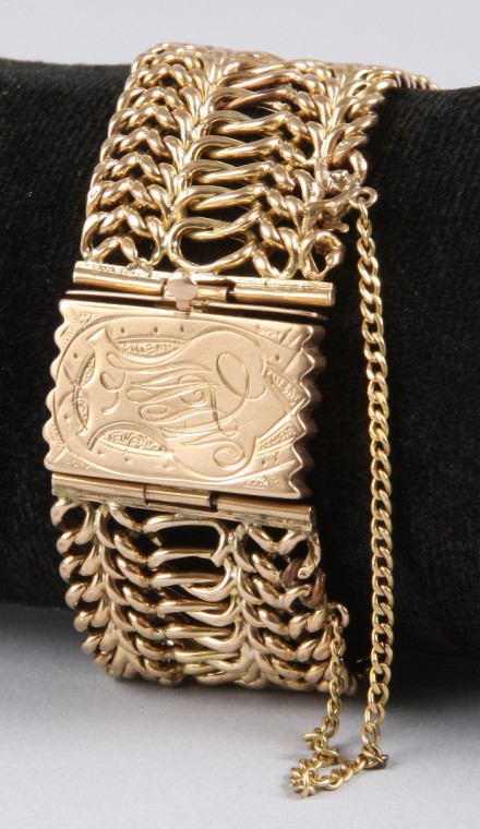 Appraisal: K rosey yellow gold mm wide with engraved clasp with