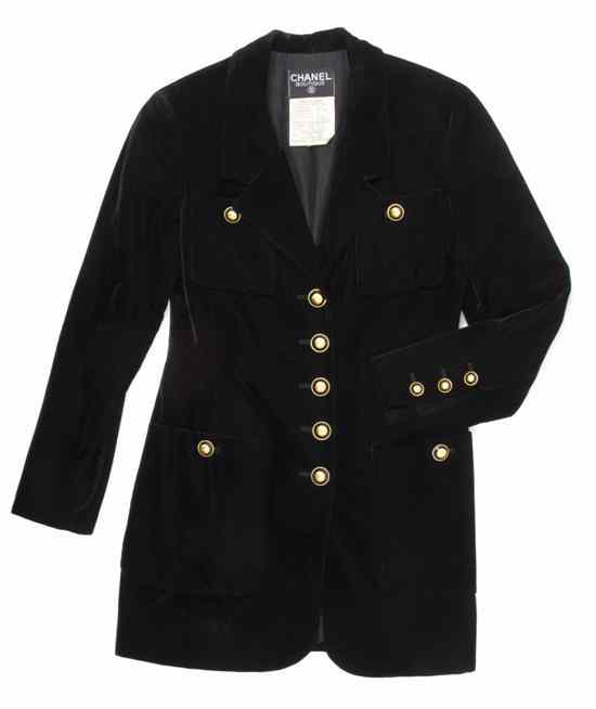 Appraisal: A Chanel Black Velvet Jacket with gold logo buttons Labeled