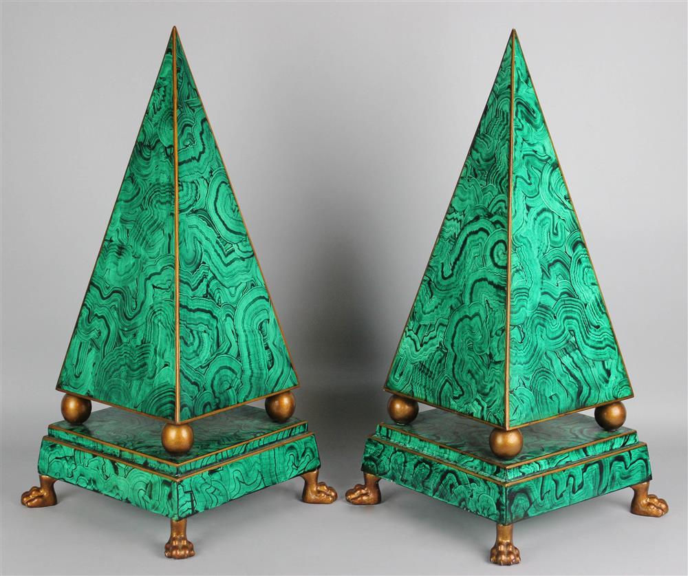 Appraisal: PAIR OF FAUX MALACHITE OBELISKS each paper-covered panel with gilt