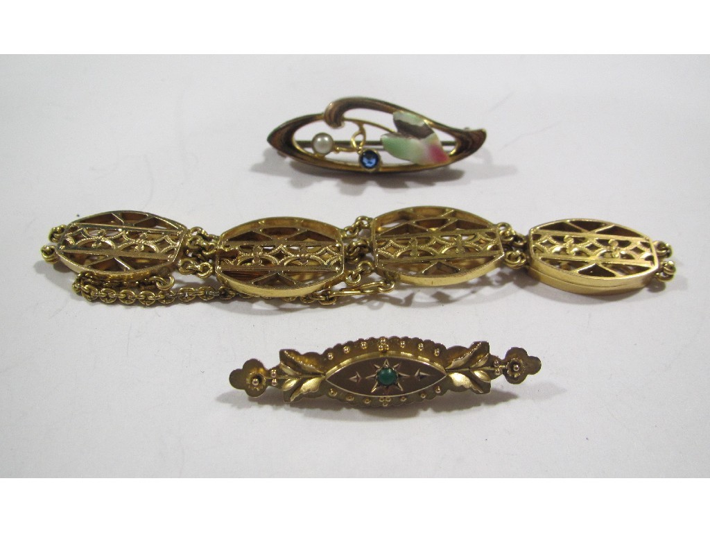 Appraisal: Lot comprising two gold bar brooches and a yellow metal