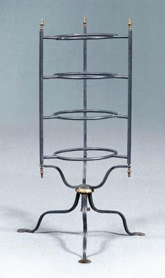 Appraisal: Revolving iron plate rack th century style with tripod base