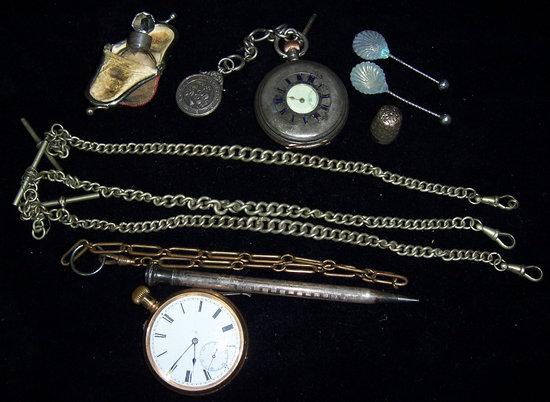 Appraisal: A half hunter pocket watch the case an open faced