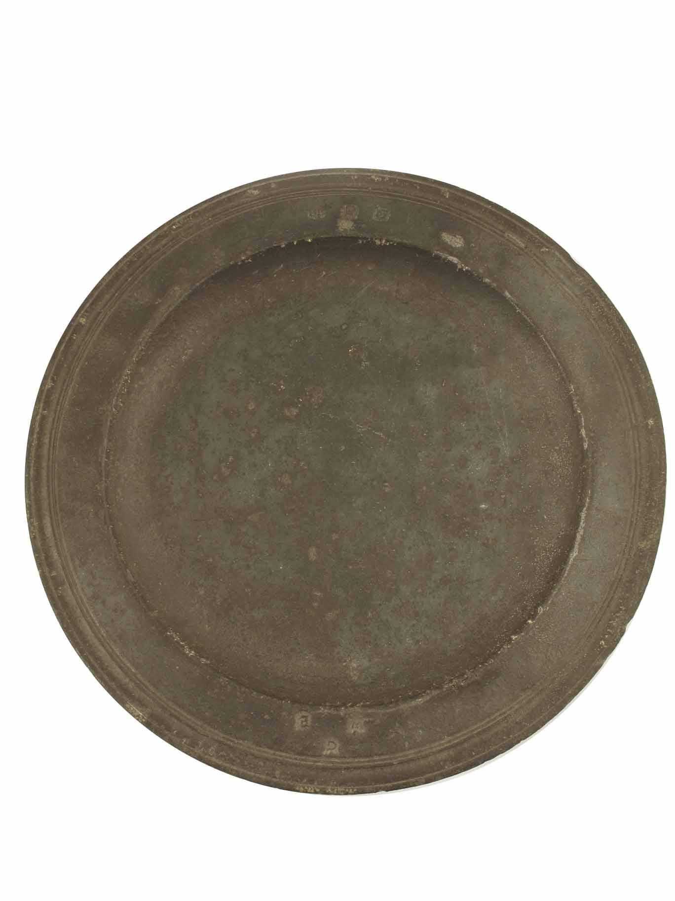 Appraisal: A William amp Mary pewter multi reed plate by Edward