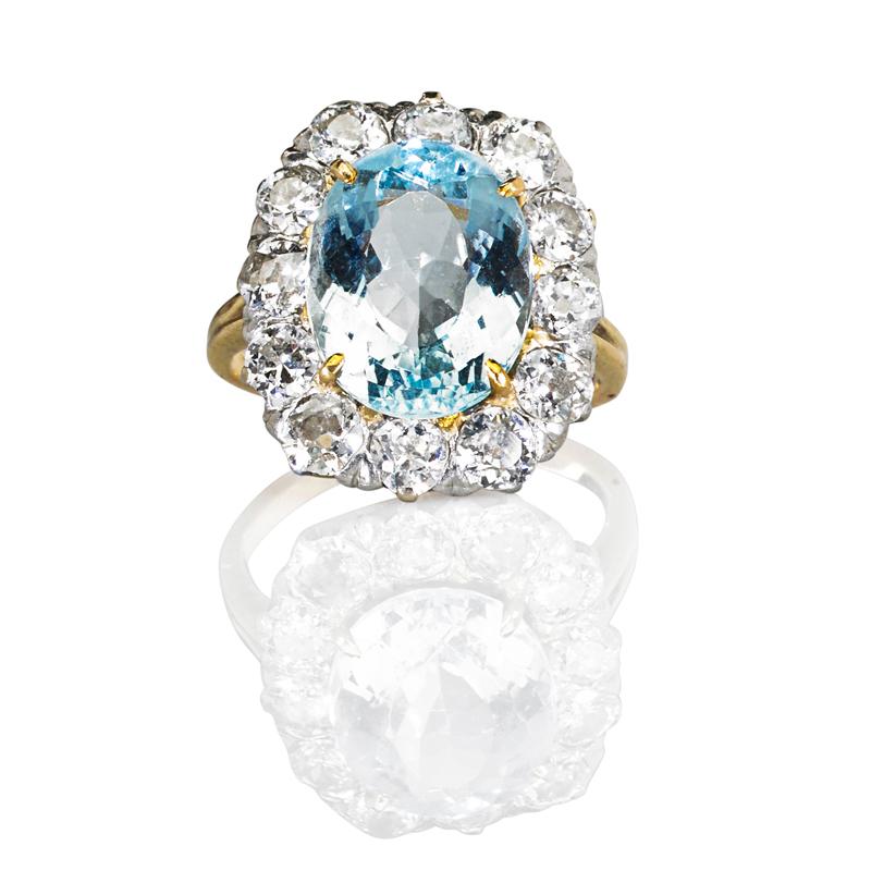 Appraisal: AQUAMARINE AND DIAMOND K PRINCESS RING Oval faceted aquamarine approx