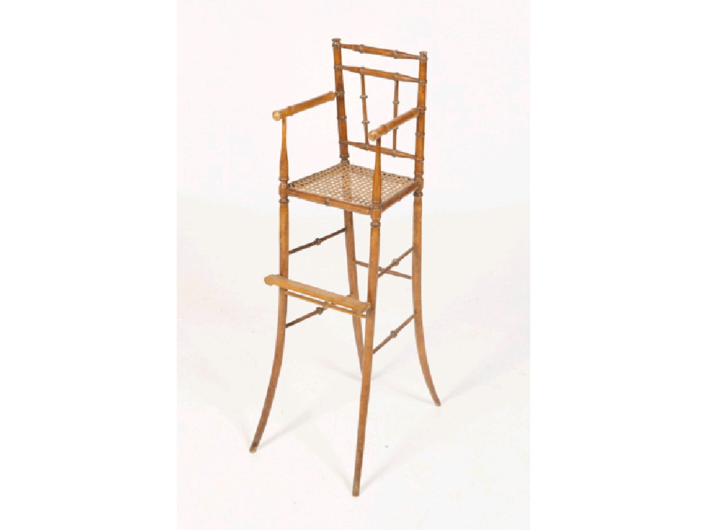 Appraisal: A MINIATURE TURNED BEECH HIGH CHAIR with bamboo effect turned