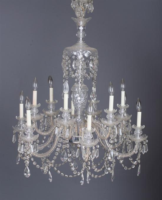 Appraisal: GEORGIAN CRYSTAL TWELVE-LIGHT CHANDELIER th century Drop-hung corona inverted bowl-form