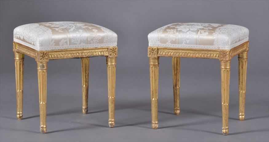 Appraisal: PAIR OF LOUIS XVI CARVED GILTWOOD TABOURETS Each square seat