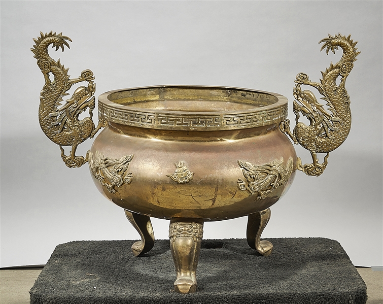 Appraisal: Large Chinese bronze tripod censer with dragon ears and relief