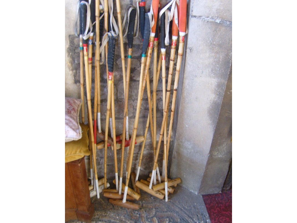 Appraisal: A large collection of polo mallets etc