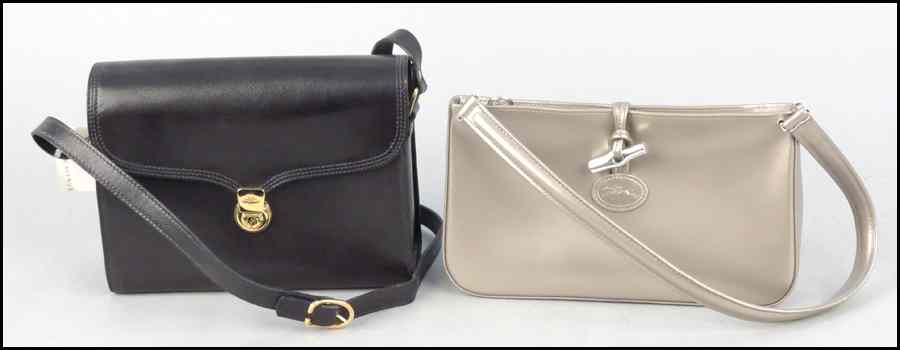 Appraisal: LONGCHAMP BLACK LEATHER SHOULDER BAG Together with a Longchamp silver