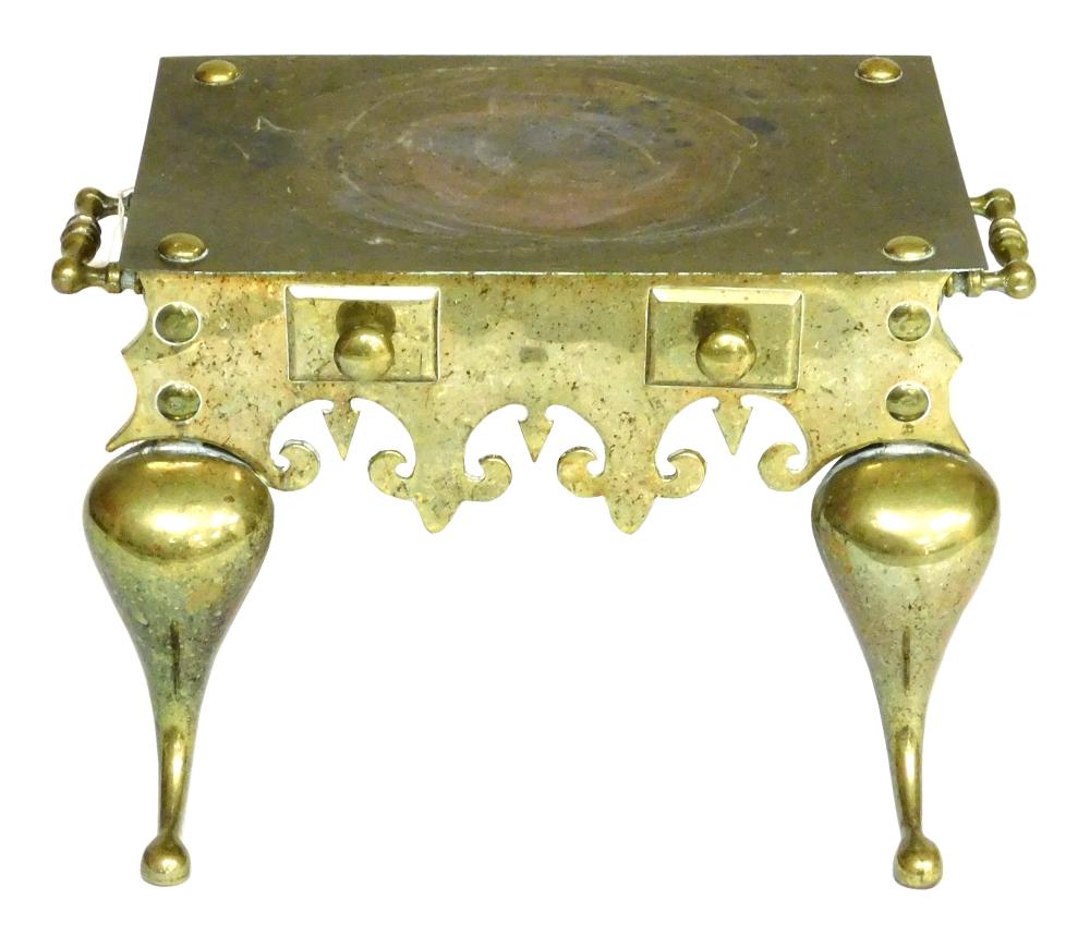 Appraisal: Brass trivet th th C with two knob handles on