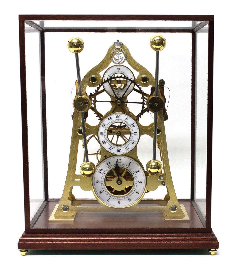 Appraisal: A reproduction gilt brass skeleton clock with seperate hours minutes