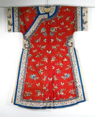 Appraisal: A Chinese red silk coat decorated with flowers and butterflies