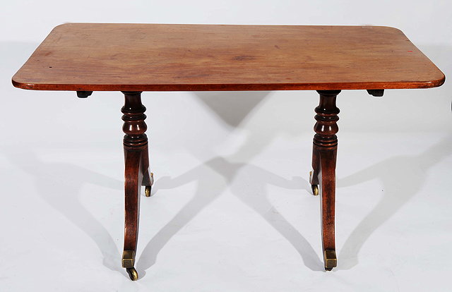 Appraisal: A GEORGIAN MAHOGANY SOFA TABLE lyre end supports terminating in