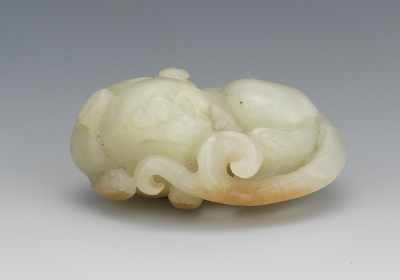 Appraisal: A Carved Jade Recumbent Baby Dragon Ornament Greenish white jade