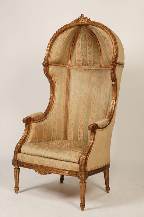 Appraisal: A LOUIS XV STYLE COVERED ARMCHAIR the raised back with