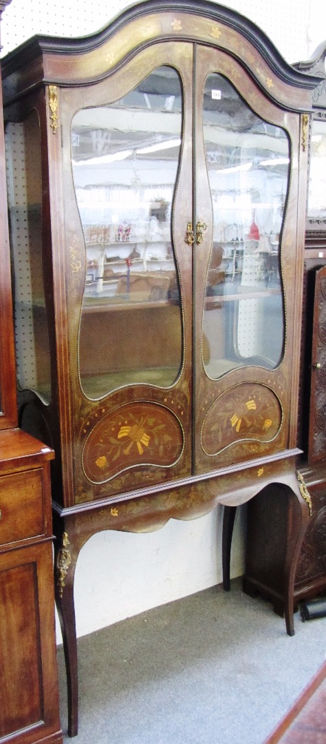 Appraisal: A late th century gilt metal mounted marquetry inlaid mahogany